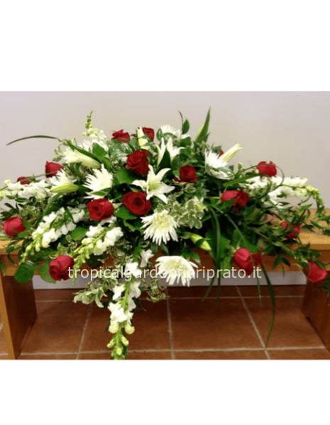 Cuscino funebre con fiori bianchi e rossi