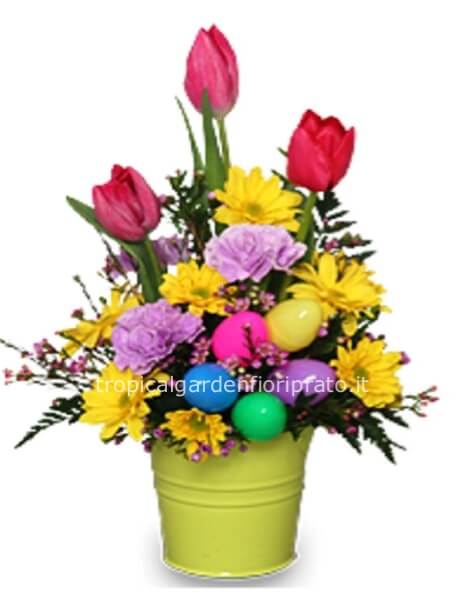 Composizione pasquale con fiori colorati