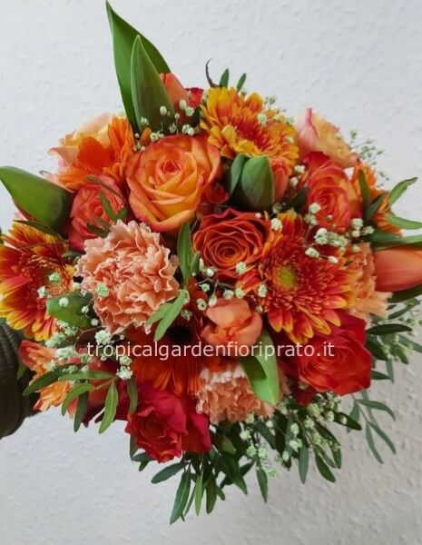 Bouquet compatto di fiori misti orange